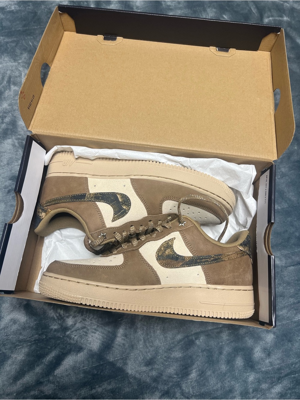 Low-Top Suede Sneakers in Brown and Cream with Patterned Swoosh